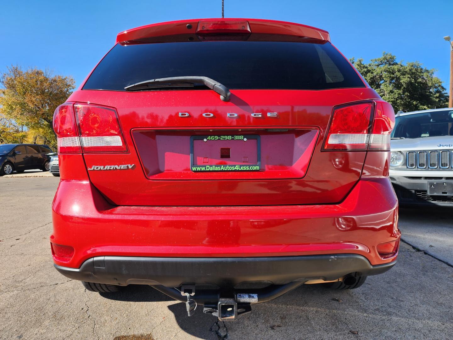 2015 RED Dodge Journey SXT (3C4PDCBBXFT) with an 2.4L L6 DOHC 16V engine, 4-Speed Automatic transmission, located at 2660 S.Garland Avenue, Garland, TX, 75041, (469) 298-3118, 32.885551, -96.655602 - Welcome to DallasAutos4Less, one of the Premier BUY HERE PAY HERE Dealers in the North Dallas Area. We specialize in financing to people with NO CREDIT or BAD CREDIT. We need proof of income, proof of residence, and a ID. Come buy your new car from us today!! This is a SUPER CLEAN 2015 DODGE JOUR - Photo#4